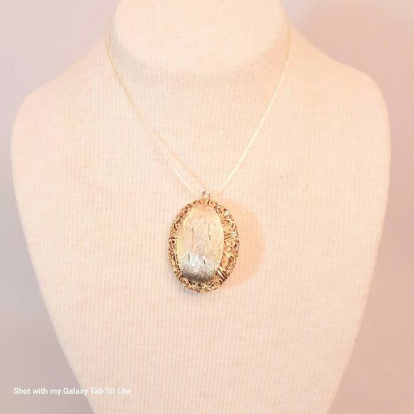 Ornate Gold Tone Locket Pendant FIlagree Border Textured Frosted Center - Picture 1 of 7